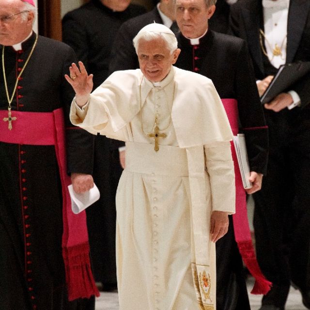 Pope Benedict XVI waves as he arrives to lead his general audience in Paul VI hall at the Vatican Dec. 28. 