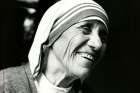 Blessed Teresa of Kolkata smiles during the opening of a Missionaries of Charity convent in Detroit in 1979.