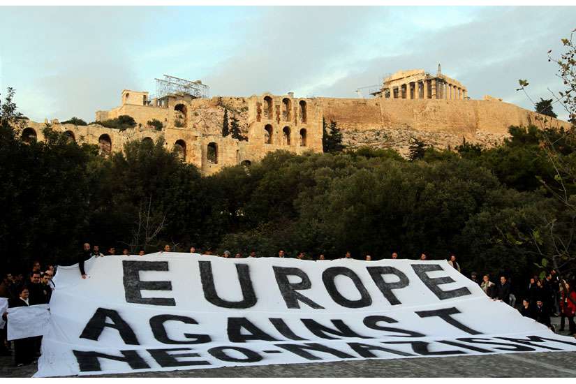 People demonstrate silently in this 2012 file photo of a protest in Athens, Greece, against a rising surge of racism, anti-Semitism and neo-Nazism in Europe.