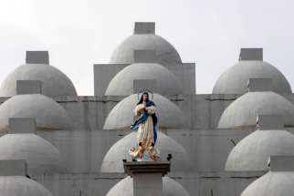 A statue of Mary is seen in 2017 atop the Cathedral of Managua in Nicaragua. On Nov. 18, 2019, a pro-government mob entered the cathedral, damaging property, attacking hunger strikers inside the building and jostling a priest and nun, the Archdiocese of Managua said.