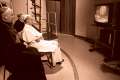 Pope Paul VI watches the moon landing on television at the Vatican Observatory in Castel Gandolfo, Italy.