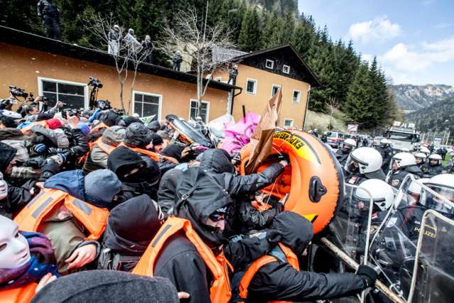 Austrian riot police clash with protesters April 24 during a rally against the government&#039;s planned re-introduction of border controls at Brenner Pass near Italy.