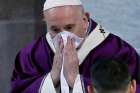 Pope Francis uses a handkerchief during Ash Wednesday Mass at the Basilica of Santa Sabina in Rome Feb. 26, 2020.