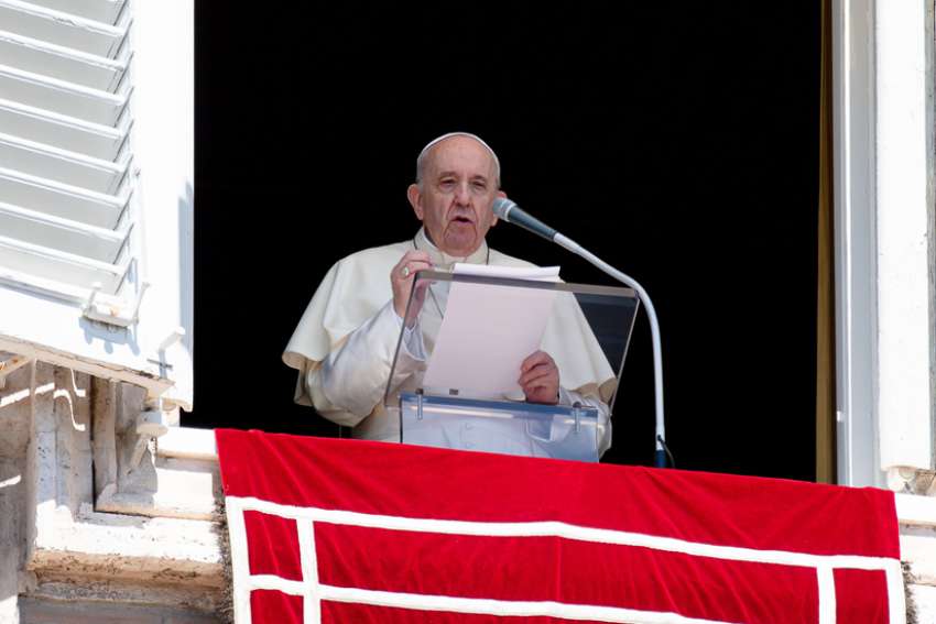 Pope Francis speaks as he leads the Angelus from the window of his studio overlooking St. Peter&#039;s Square at the Vatican Aug. 29, 2021. The pope appealed for intensified prayers and fasting for the situation in Afghanistan.