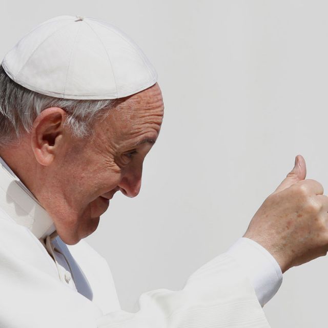 Pope Francis gives a thumbs up as he leaves his general audience in St. Peter&#039;s Square at the Vatican April 10.
