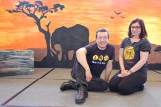 Enrique Segura, a Broadway actor, and his wife, Kristi, a choreographer, pose on the set of &quot;The Lion King Jr.&quot; in early May at the School of Sacred Heart St. Francis de Sales in Bennington, Vt. &quot;The Lion King Jr.,&quot; a 60-minute adaptation of the show about love and redemption, was created especially for the strengths and skill level of middle- school students.