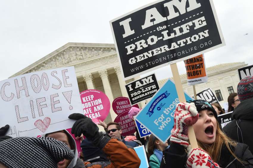 Pro-life advocates gather outside the U.S. Supreme Court Jan. 27, 2017, during the annual March for Life in Washington. According to a report released Sept. 18, 2019, by the Guttmacher Institute, which researches data on abortion, the number and rate of abortions nationwide have fallen to their lowest levels since the Supreme Court&#039;s Roe v. Wade decision legalized abortion on demand in 1973. The report is based on data from 2017, the last year for which full numbers were available.