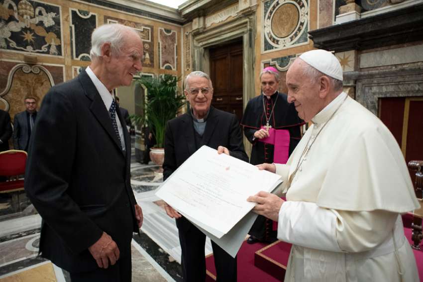 Pope Francis presents the Ratzinger prize to philosopher Charles Taylor during a ceremony at the Vatican Nov. 9, 2019. Taylor and Jesuit Father Paul Bere were chosen as prize winners by the Joseph Ratzinger-Benedict XVI Foundation.