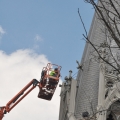 Inspectors evaluate the damaged steeple of St. Patrick Church in the Fells Point area of Baltimore Aug. 24.