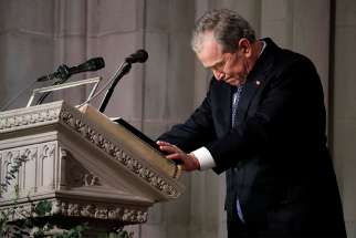 Former U.S. President George W. Bush pauses as he speaks at the state funeral for his father, former President George H.W. Bush, Dec. 5 at the Episcopal Church&#039;s Washington National Cathedral. 