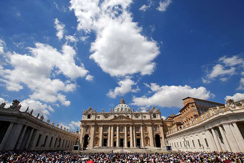 The faithful attend the Angelus prayer led by Pope Francis in St. Peter&#039;s Square at the Vatican on Aug. 14, 2016. 