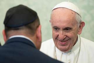 Pope Francis greets a rabbi during an audience with a group of rabbis attending the World Congress of Mountain Jews, at the Vatican Nov. 5. 