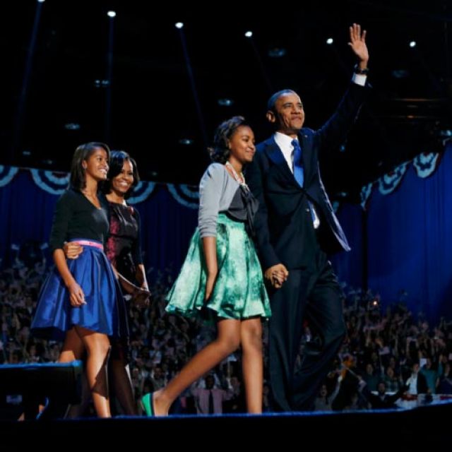 U.S. President Barack Obama walks on stage with first lady Michelle Obama and daughters Malia, left, and Sasha during his victory rally in Chicago Nov. 7. 