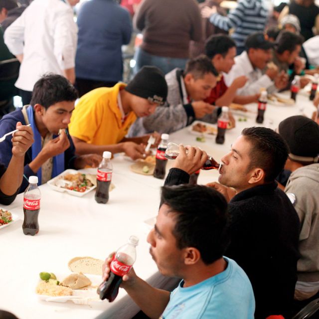 Migrants from Central America eat at the St. Juan Diego migrant shelter in Tultitlan, Mexico, Jan. 20.