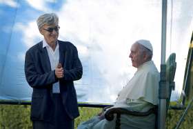  German filmmaker Wim Wenders is pictured in this undated photo with Pope Francis during the production of his documentary film, &quot;Pope Francis -- A Man of His Word.&quot; The film was compiled from four long sit-down sessions with the pope and from clips of the pope at the Vatican and abroad. It is scheduled for release in theaters May 18.