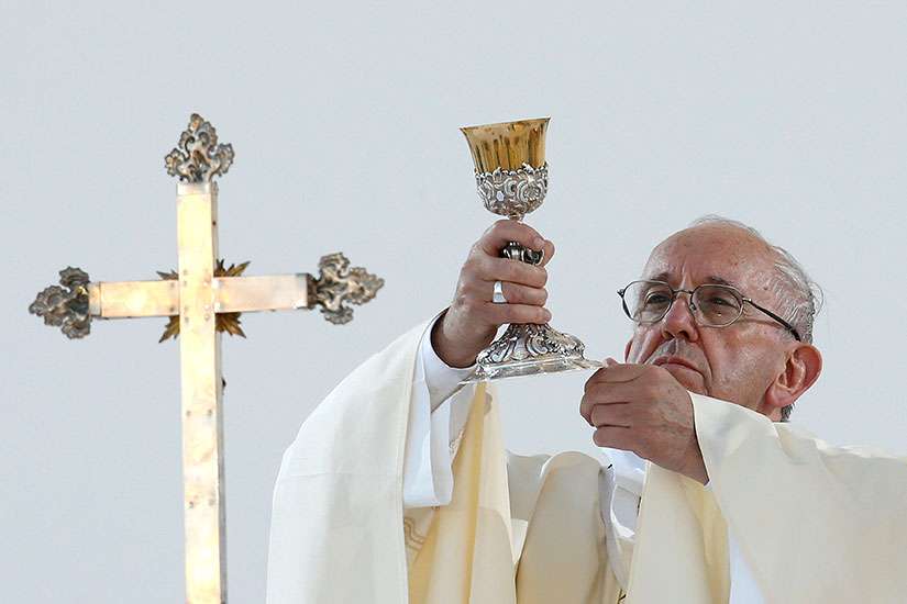Pope Francis celebrates Mass May 27 during his pastoral visit in Genoa, Italy.