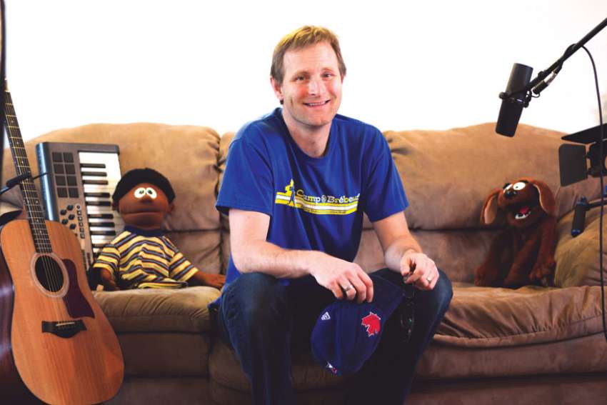 Jason Taylor, with his puppet characters Opus, left, and Joyous, are out to fill the void in Catholic children video series.