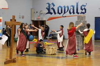 Elementary students dress up and perform a traditional Inuit dance during the liturgy at the Northern Spirit Games at Toronto’s Bishop Marrocco Catholic High School. 