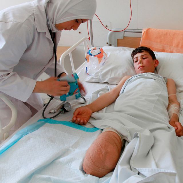 Ahmad Sadek, a 13-year-old Syrian boy, receives medical treatment from a nurse in a government hospital in Tripoli, Lebanon, June 4. During his June 3 homily, Lebanon&#039;s Maronite Catholic Patriarch Bechara Rai condemned the previous day&#039;s clashes in Tripoli in which fighting between Sunni groups opposing Syrian President Bashar Assad and Alawites who support the Syrian leader.