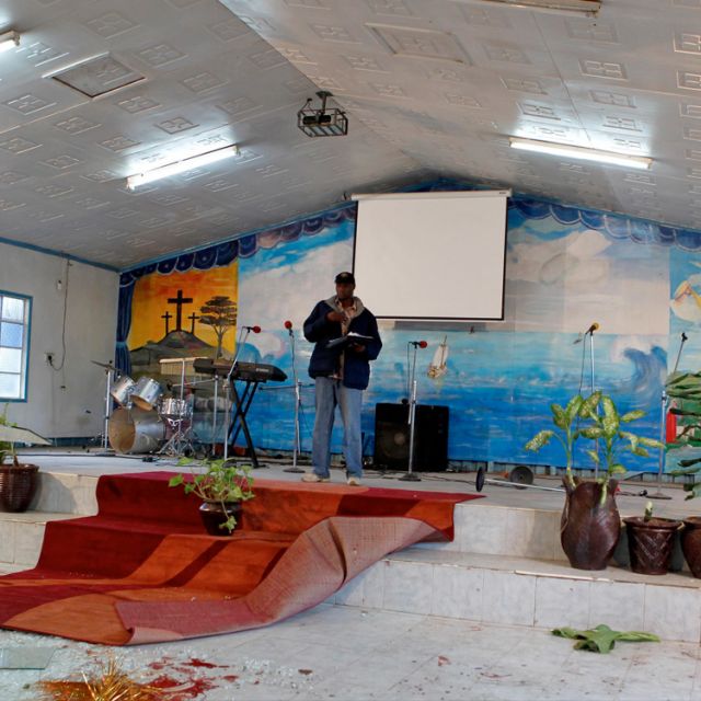 The latest church attacks are not the first to affect Kenyans this year. Pictured is a detective standing at the scene of a grenade attack inside the God&#039;s House Of Miracles International Church in Nairobi, Kenya, April 29. At least one person died and 15 people were wounded when a grenade was thrown into the church in Kenya&#039;s capital during Sunday service.