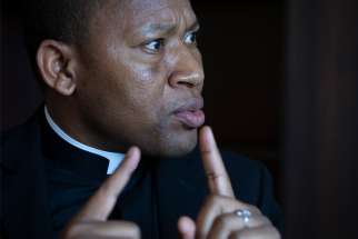 Father Joseph Bature Fidelis of Adamawa, Nigeria, is seen during an interview with Catholic News Service in Washington March 9, 2020.