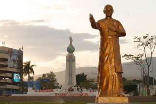 The right hand of a nearly 10-foot tall statue of Archbishop Oscar Romero is seen cut off March 6 near Plaza El Divino Salvador del Mundo in San Salvador, El Salvador. Archbishop Romero recently was declared a martyr. 