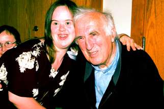 Jean Vanier, left, with Amanda, a member of the L’Arche community in Canada. Vanier has won the 2015 Templeton Prize for making “exceptional contributions” to affirming the spiritual aspect of life. He said he will donate the money to his charities so that they can expand the work for people with developmental disabilities internationally.