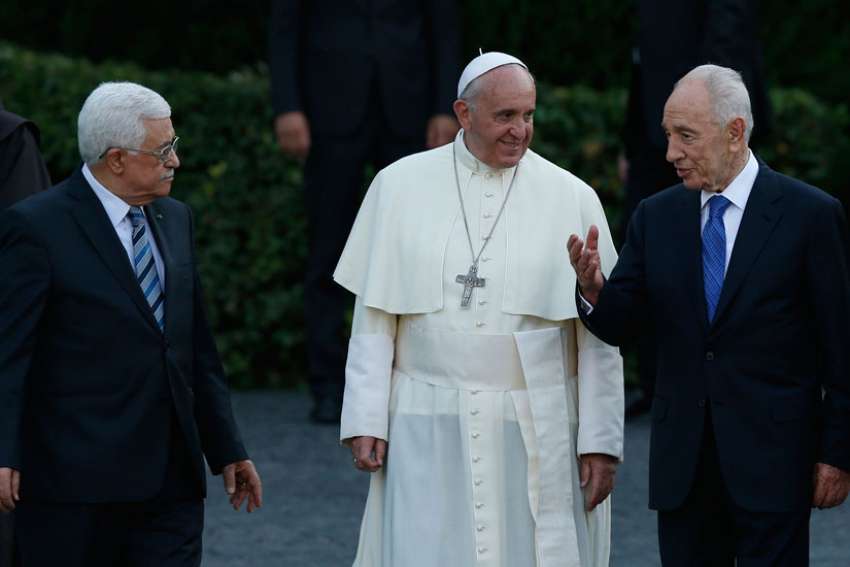 Palestinian President Mahmoud Abbas, Pope Francis and the late Israeli President Shimon Peres arrive for an invocation for peace in the Vatican Gardens June 8, 2014.