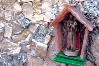 In the backyard of a retired mosaic artist in the municipality of Cavasso Nuovo, a small pocket has been carved out to house this small figurine of St. Anthony of Padua.