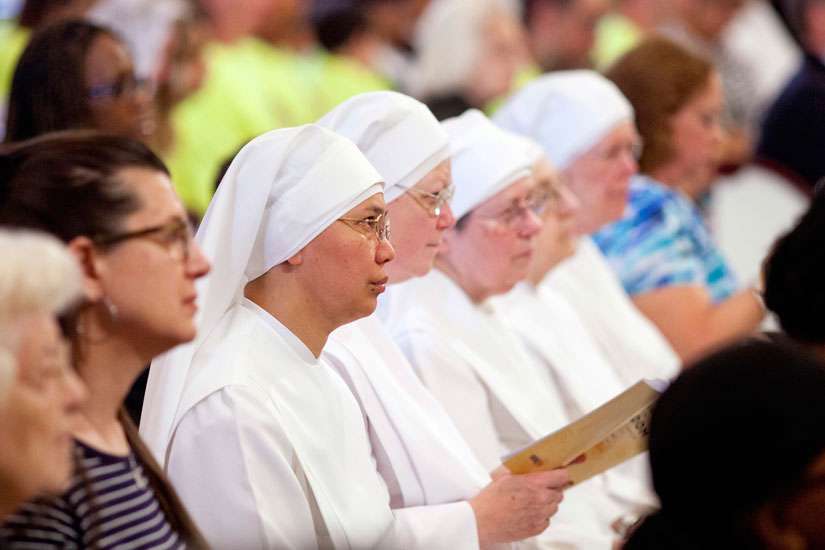Members of the Little Sisters of the Poor attend the 2014 celebration of the third annual Fortnight for Freedom Mass at the Basilica of the National Shrine of the Assumption of the Blessed Virgin Mary in Baltimore. The 10th U.S. Circuit Court of Appeals ruled July 14 the Little Sisters and other religious entities are not substantially burdened by federal procedures that would enable them to avoid providing contraceptives in health insurance coverage.