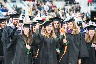 Graduates celebrate at the University of Notre Dame at the conclusion of the May 15 commencement ceremony in Indiana.