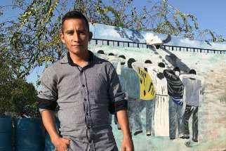 Edelmiro Cardona poses for a photo in Saltillo, Mexico. He has decided to stay in Mexico rather than cross into the United States.
