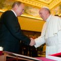 Pope Francis shakes hands with Russian President Vladimir Putin during a private audience at the Vatican Nov. 25.