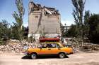 A man in Toretsk, Ukraine, drives away from his destroyed house Aug. 22 as Russia’s attack on the Ukraine continues. Canadian agencies are helping Ukraine’s prepare for a long winter.