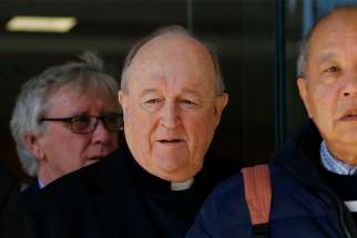 Archbishop Philip Wilson of Adelaide, Australia, leaves the Newcastle Local Court in mid-August. An Australian judge overturned the conviction of Archbishop Wilson for failing to report allegations of child sexual abuse by a priest. 