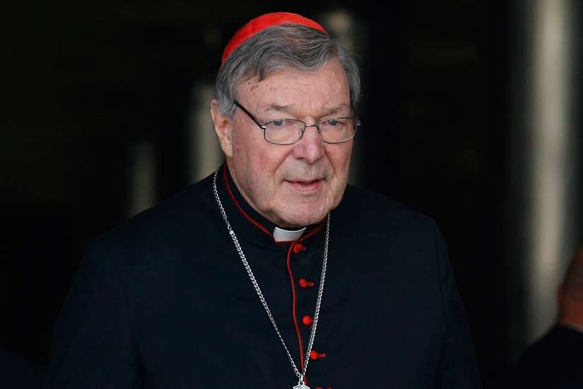 Australian Cardinal George Pell leaves the opening session of the extraordinary Synod of Bishops on the family at the Vatican Oct. 6, 2014.