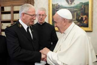 Pope Francis greets Gen. Brian Peddle, international representative and CEO of the Salvation Army, at the Vatican Nov. 8, 2019.