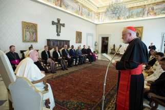 Pope Francis listens as Cardinal Sean P. O&#039;Malley of Boston, president of the Pontifical Commission for the Protection of Minors, speaks during a meeting with members of the commission at the Vatican April 21. 