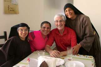 From left, Sr. Caritas, Tracey Ferguson, Deacon Robert Kinghorn and Sr. Immolatia, who came to Canada to plant a new missionary seed in the Hamilton diocese.