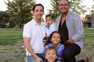 Dominc and Lisa Price and their three children.