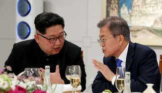 South Korean President Moon Jae-in and North Korean leader Kim Jong Un attend a banquet inside the demilitarized zone separating the two Koreas April 27.