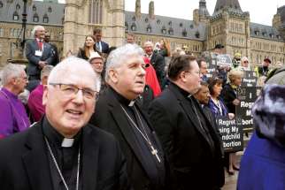 Archbishop Terrence Prendergast of Ottawa, left, with Cardinal Thomas Collins of Toronto and Cardinal Gerald Lacroix of Quebec City at the 2018 National March for Life. 