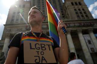 Pawel Szamburski, 29, participates in a July 27, 2019, protest in Warsaw, Poland, against violence that took place against the LGBTQ community during the first pride march in Bialystok in July.