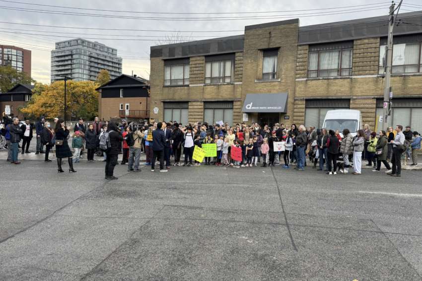 Members of a downtown Toronto neighbourhood protest in front of a building that is to house a respite centre run by the St. Felix Centre.