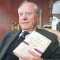 Blessed John Paul II&#039;s lifelong friend Jerzy Kluger poses in 1998 with a copy of his book &quot;The Hidden Pope.&quot;
