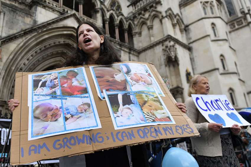 Supporters of the parents of Charlie Gard demonstrate outside England&#039;s high court in London July 13. Charlie&#039;s parents, Connie Yates and Chris Gard, petitioned the court to allow them to travel with their terminally ill child to the United States for medical treatment. The court denied their request but ruled that a U.S. doctor who specializes in the baby&#039;s condition can travel to England to examine the child.