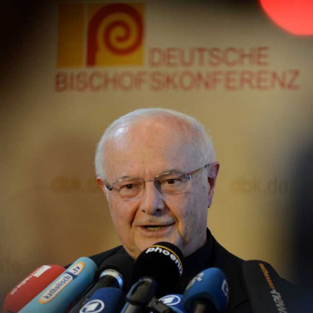The German bishops&#039; conference defended its controversial decree that said Catholics who stop paying a church membership tax cannot receive sacraments.