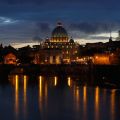 The Vatican&#039;s St. Peter&#039;s Basilica is illuminated while seen from the Tiber River in Rome March 11, the evening before the world&#039;s cardinals gather for the conclave in the Sistine Chapel to elect a new pope.