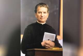 Image of St. John Bosco with an iPad depicts his zeal for evangelization by using every means of communication available. 