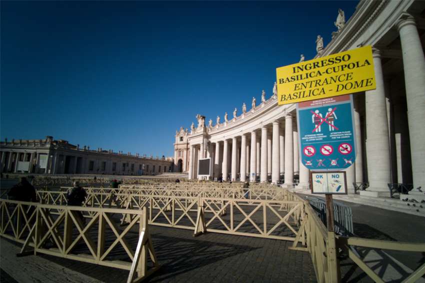 Several visitors enter an empty security queue before visiting St. Peter&#039;s Basilica at the Vatican March 4, 2020. Visitors and pilgrims to churches, museums and landmarks in Rome have sharply declined following an outbreak of the COVID-19 coronavirus in northern Italy.